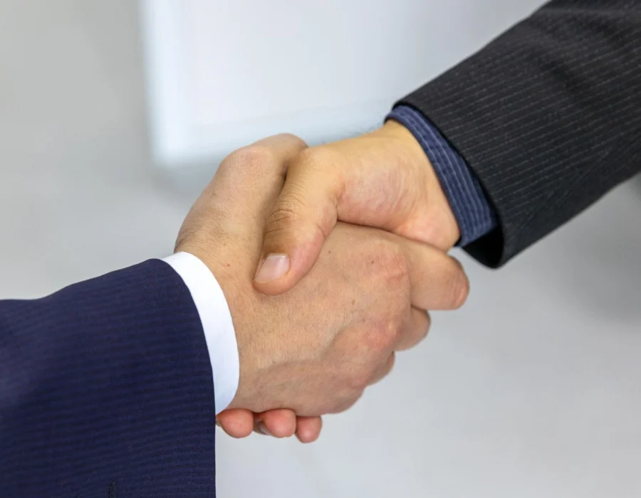 A handshake at a business meeting