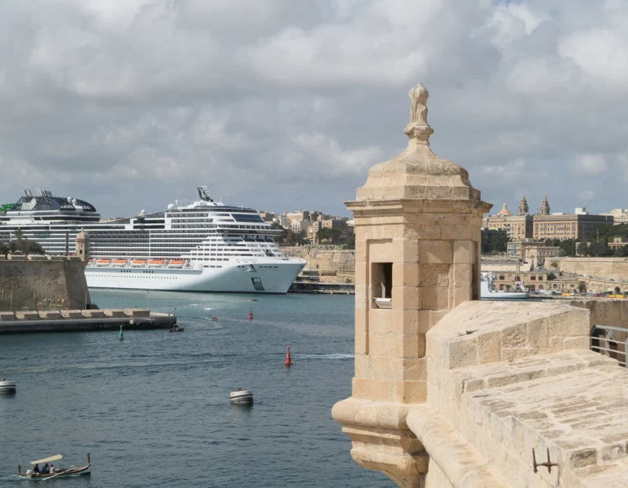Boats and historic waterfront buildings at Birgu in the Three Cities