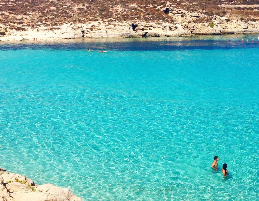 Boats moored in the Blue Lagoon at Comino