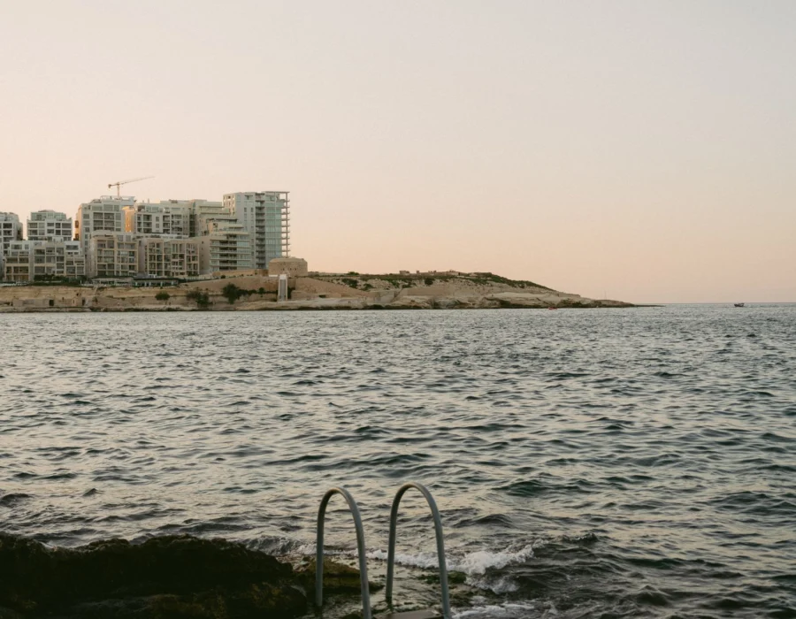 Late afternoon light on the Maltese coastline and city skyline
