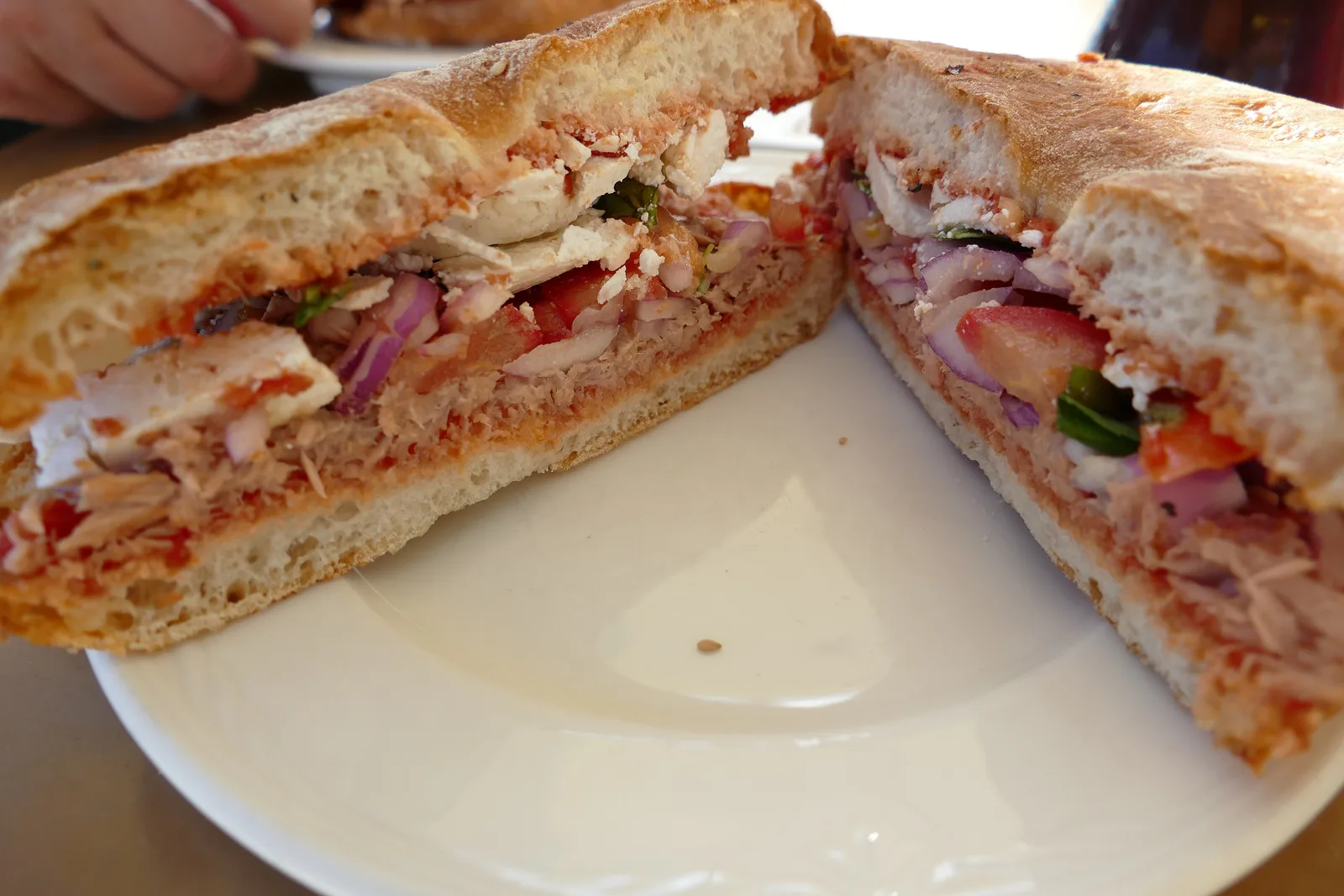 A Maltese ftira filled with tuna, olives and capers at Marsaxlokk