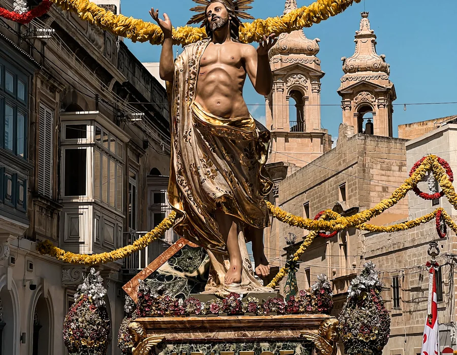 The statue of the Risen Christ carried through the street on Easter Sunday