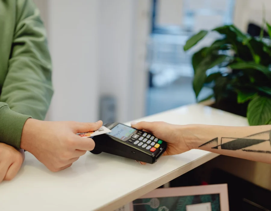 A person holding a bank card