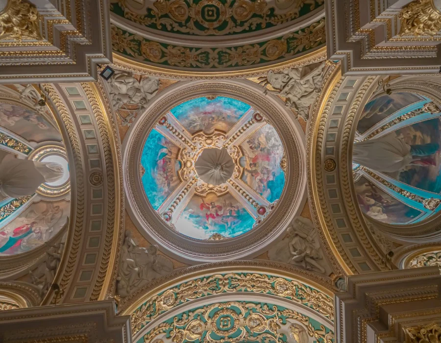An ornate painted baroque ceiling in a Maltese church