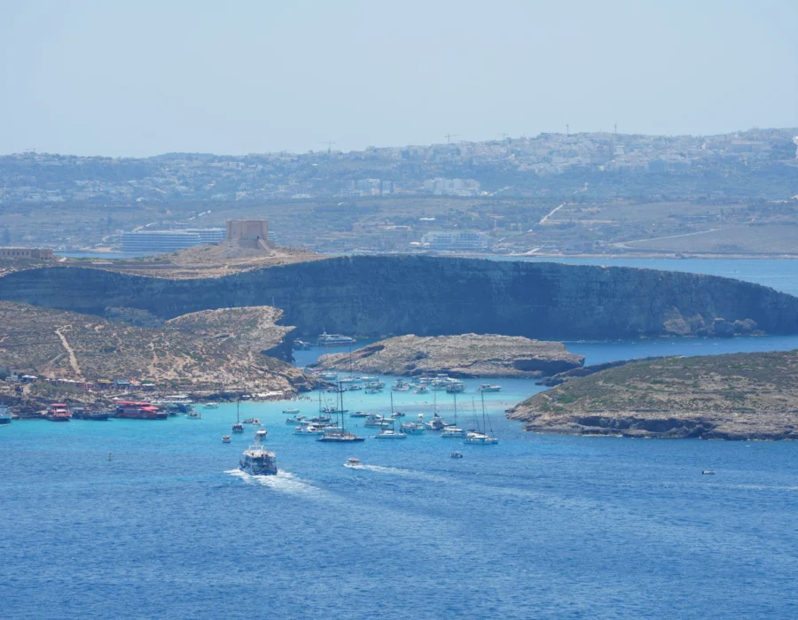 The Blue Lagoon seen from the air with boats on clear water